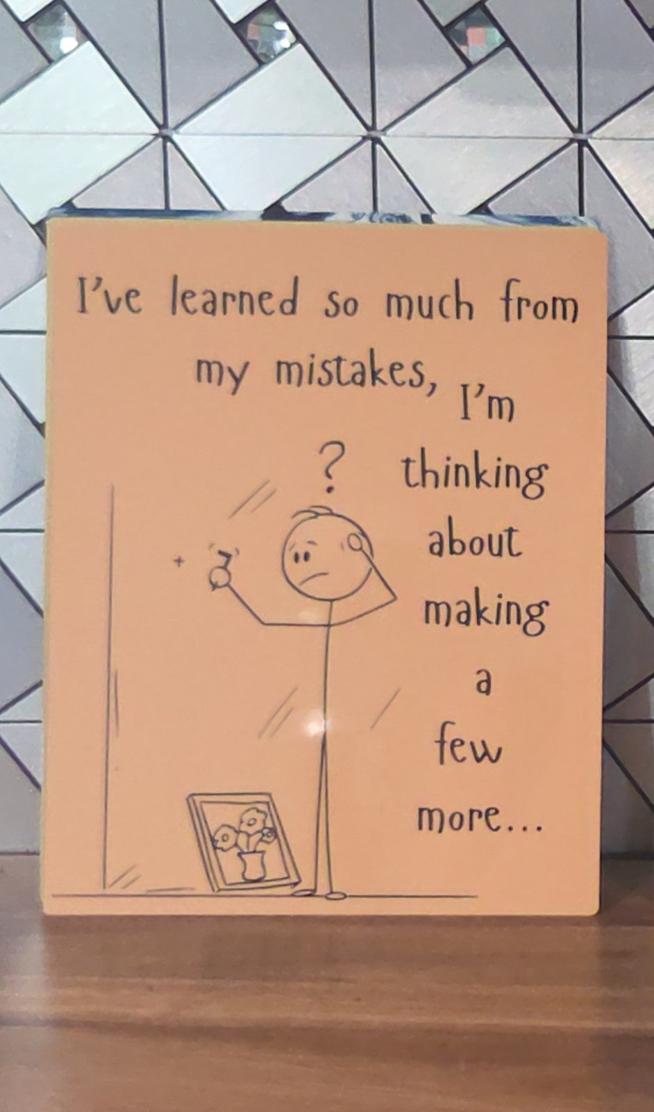 Funny sign about the mistakes we make.